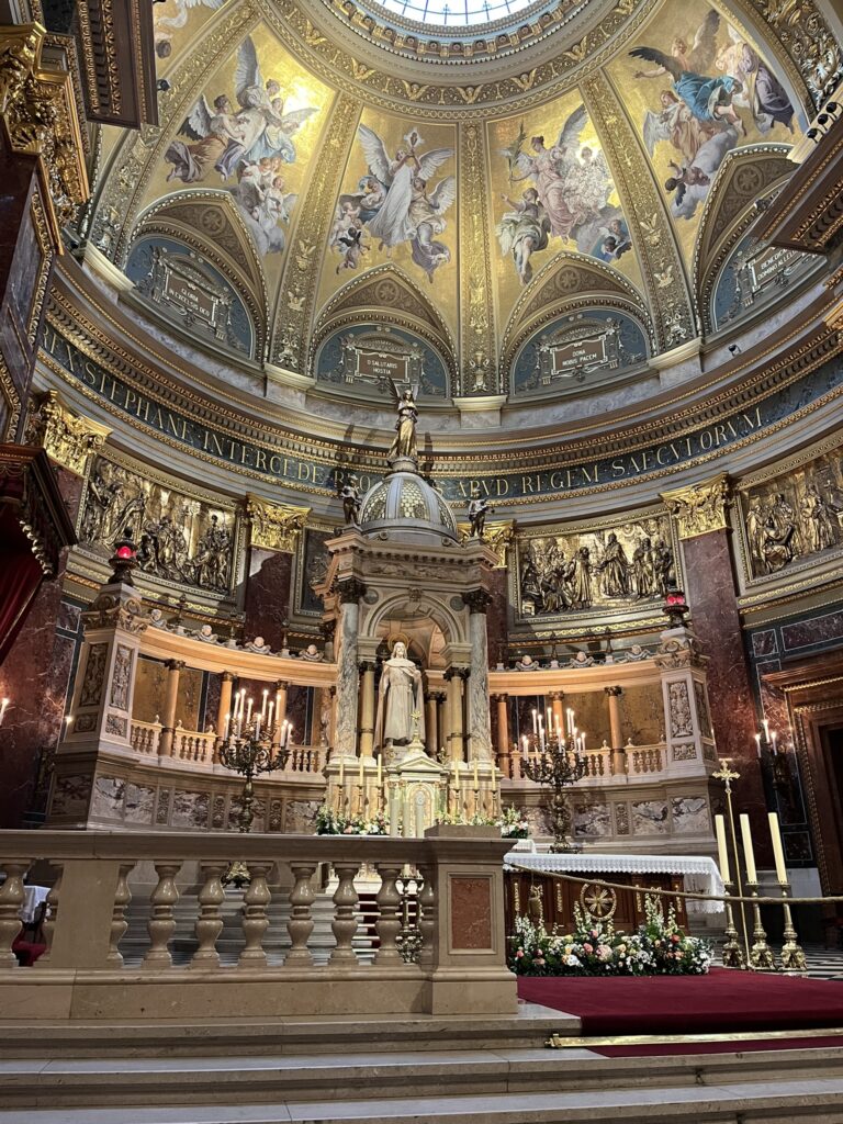 Inside church with altar and ornate fixtures