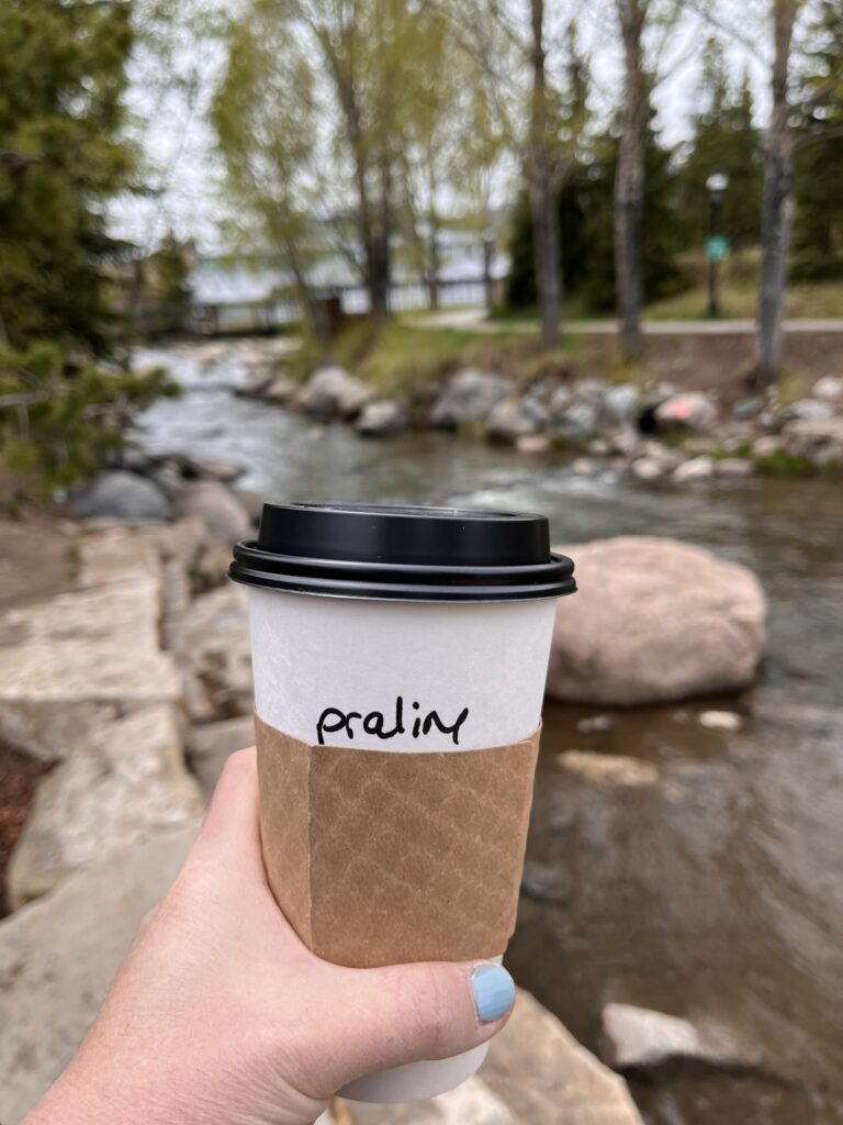 coffee cup and river