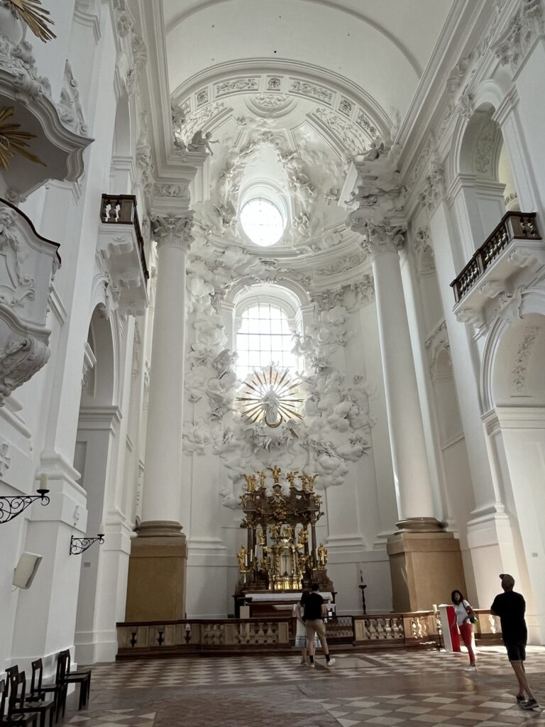 Collegiant cathedral. It features white baroque architecture in Salzburg