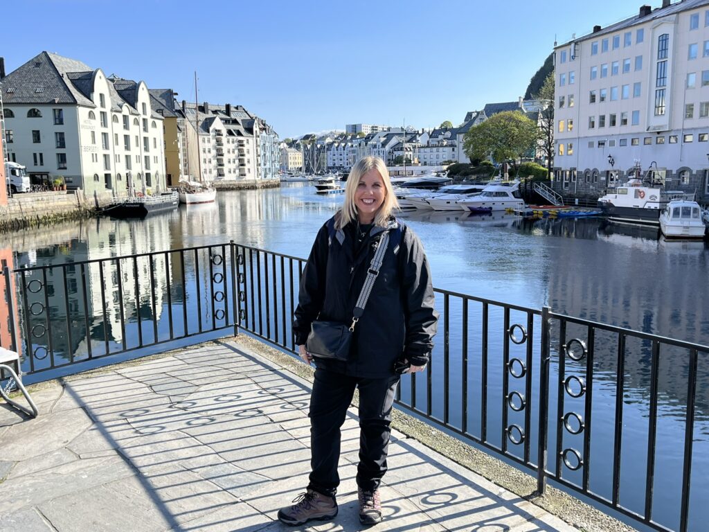 Photo of a girl at Alesund harbor