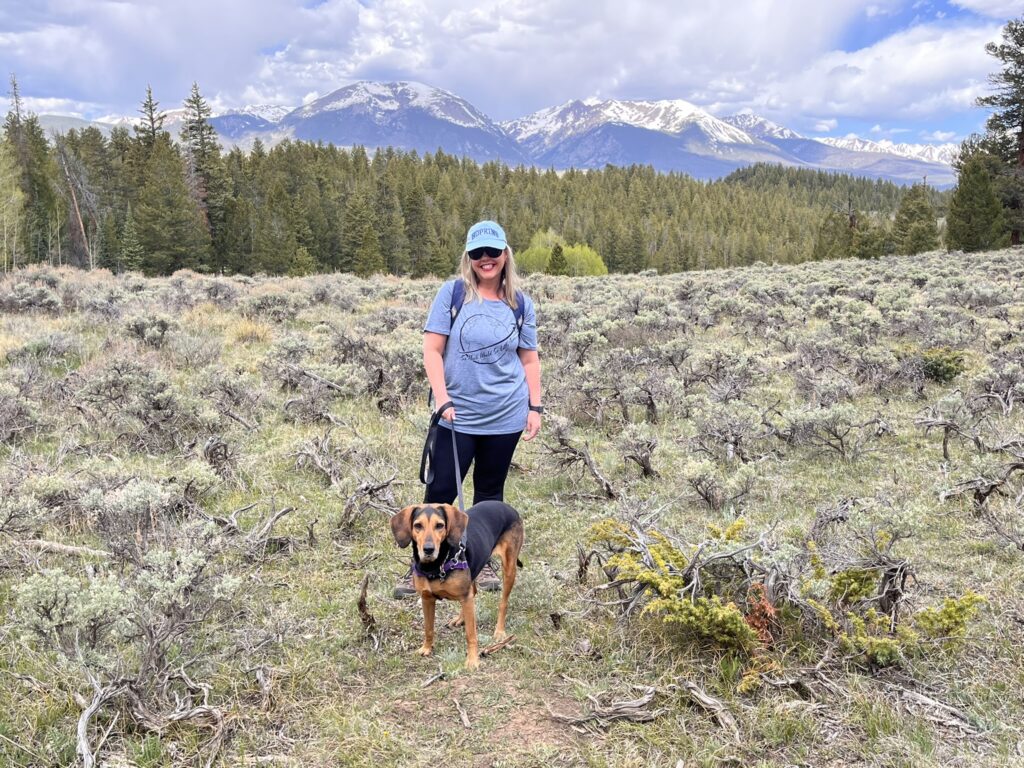 Woman and dog on hike